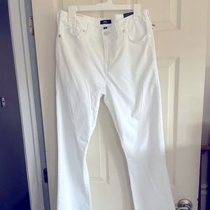 Mid rise boot cut white jeans size 32 with tags